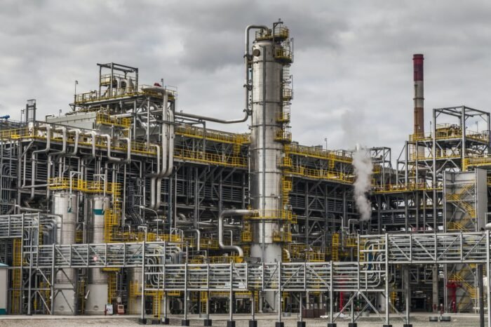 oal-mujeeb-trading-oil-refinery-factory-at-the-cloudy-sky-petrochemical-plant-petroleum.jpg